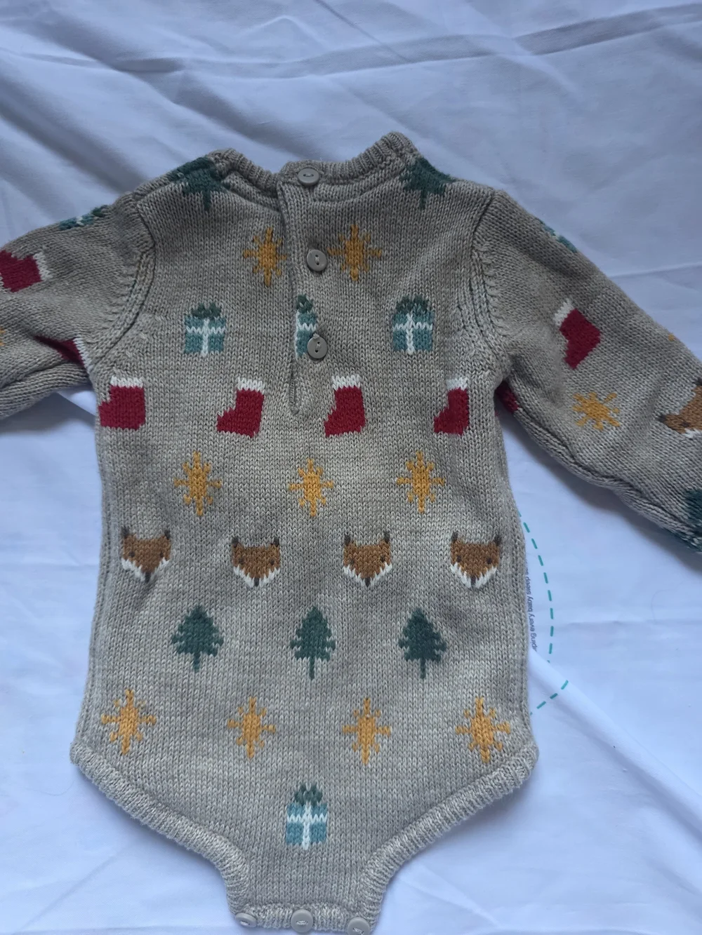 Beige Knit Baby Bodysuit with Holiday Motifs